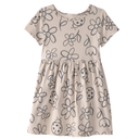 Vestido beige de flores y mariquitas para niña